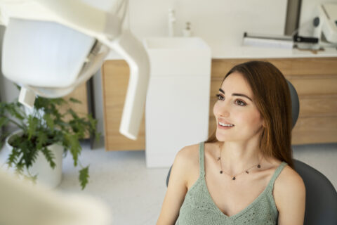 Young woman gets check up for Dental Implant in Atlanta oral surgery,GA