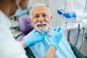 Elder man getting his dental check-up done